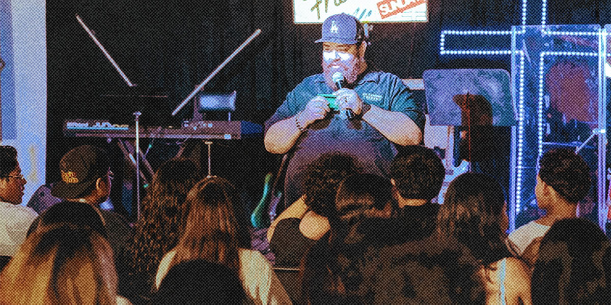Youth leader teaching youth group