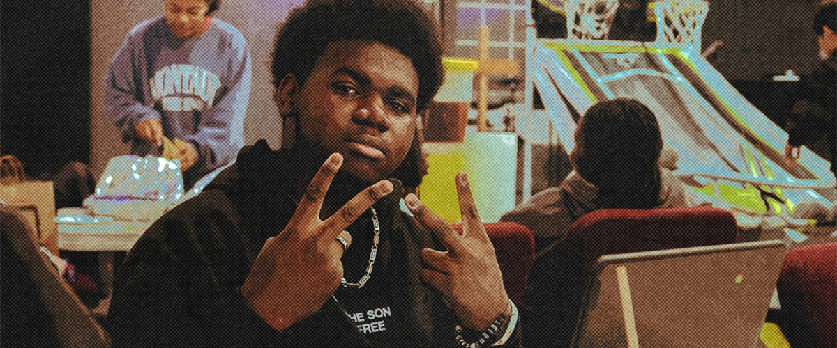 African American teenager giving peace sign