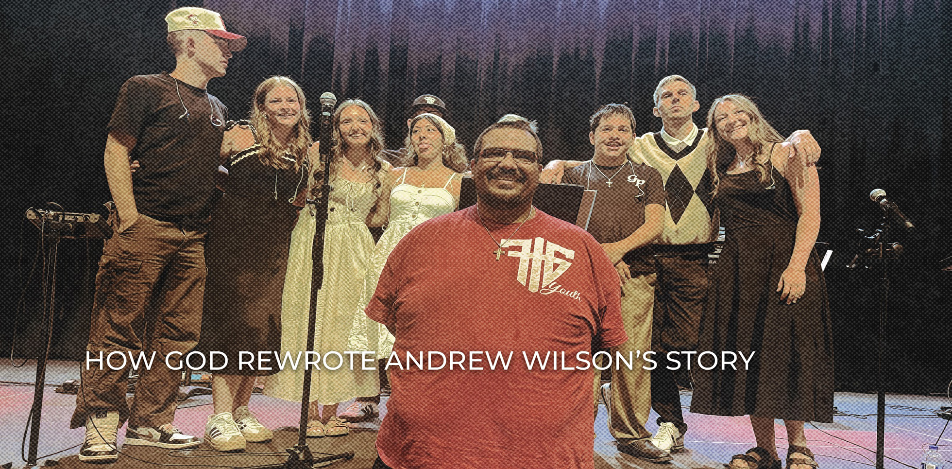 Multi-ethnic youth pastor with students