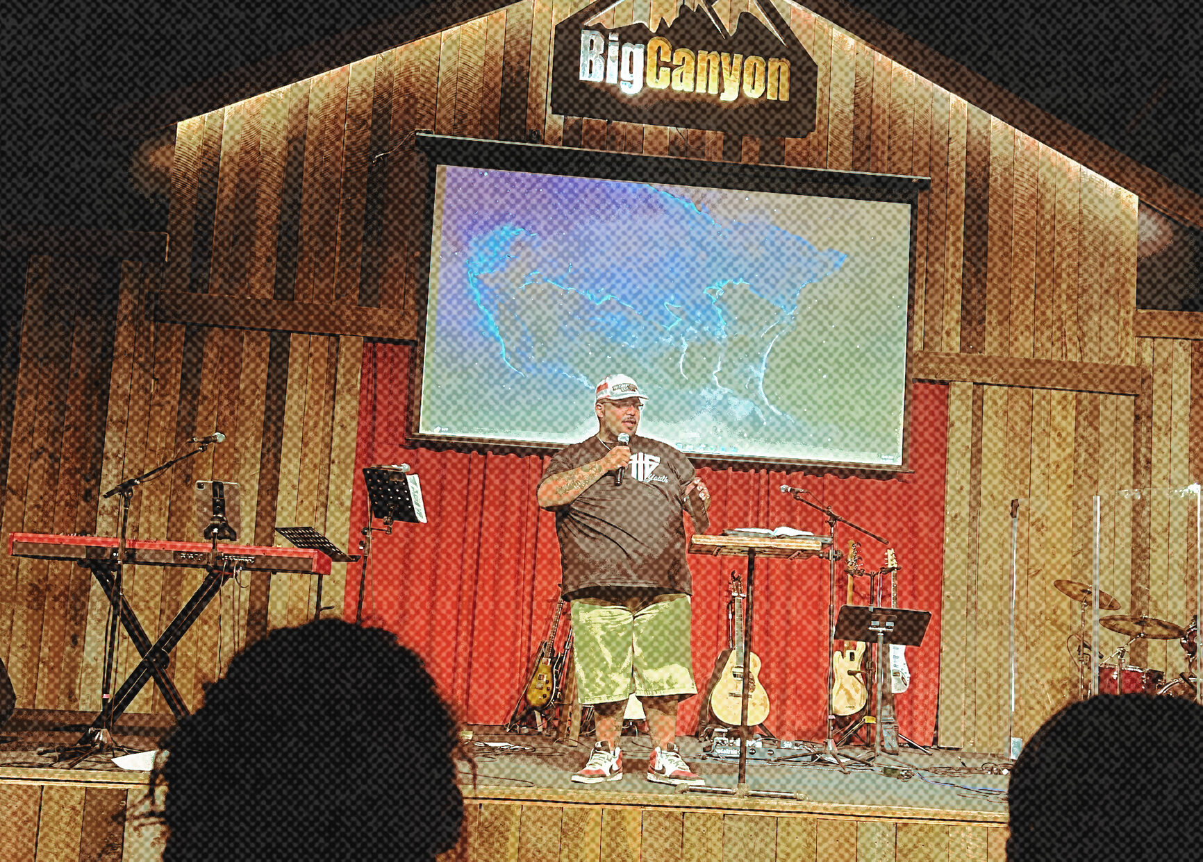 Youth pastor preaching at a camp