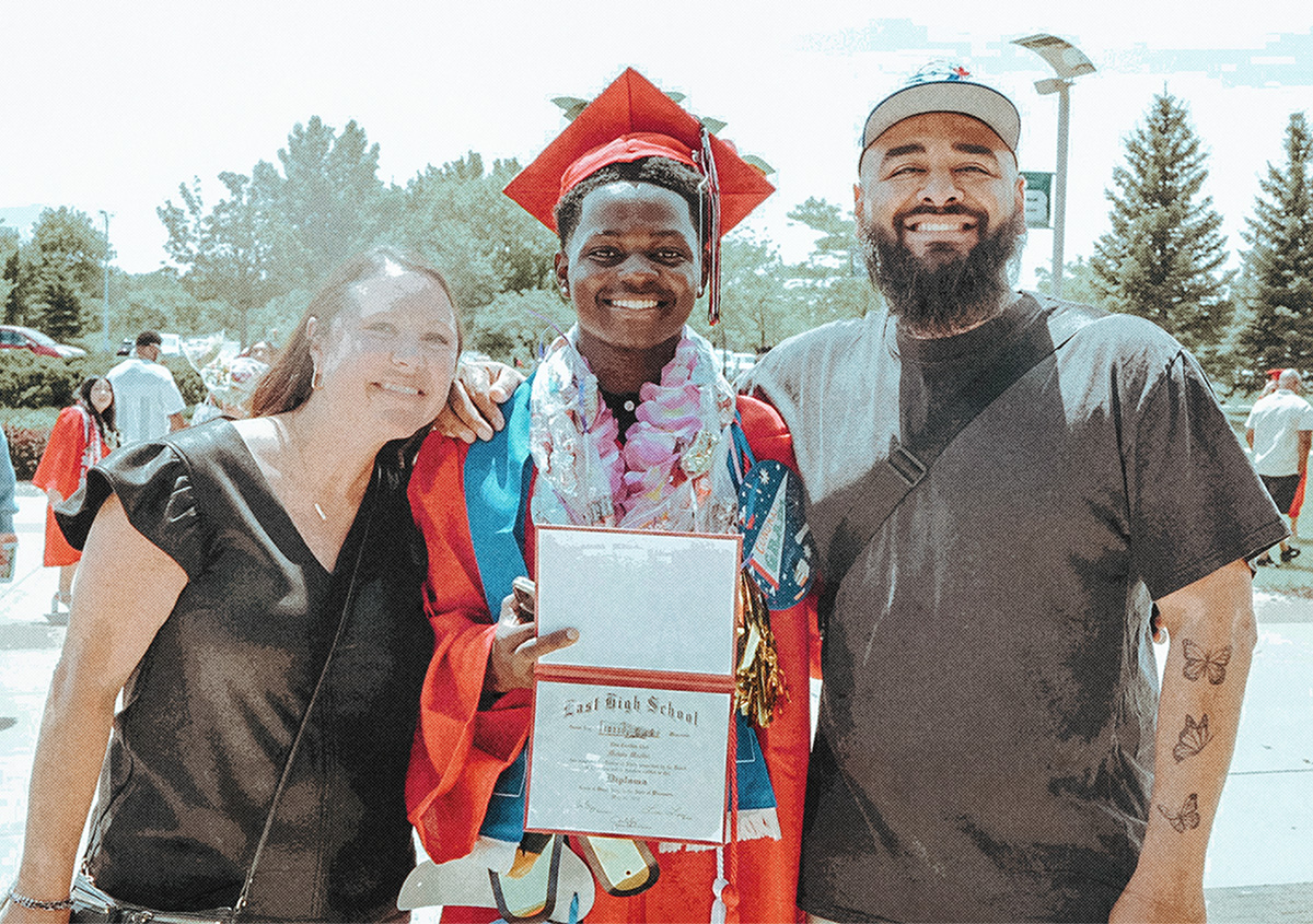 youth leaders with graduating student